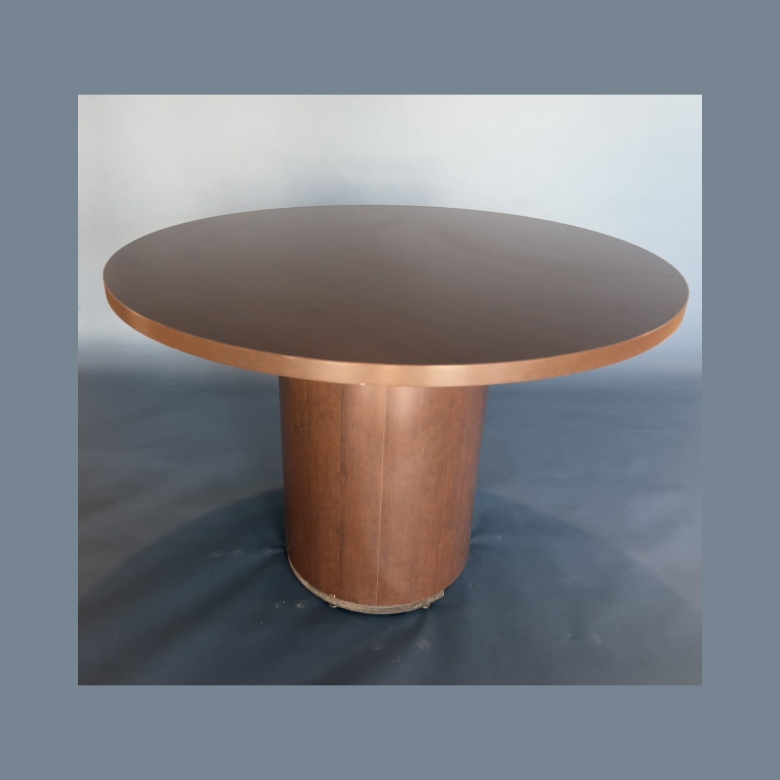 Round Walnut-Tone Pedestal Table